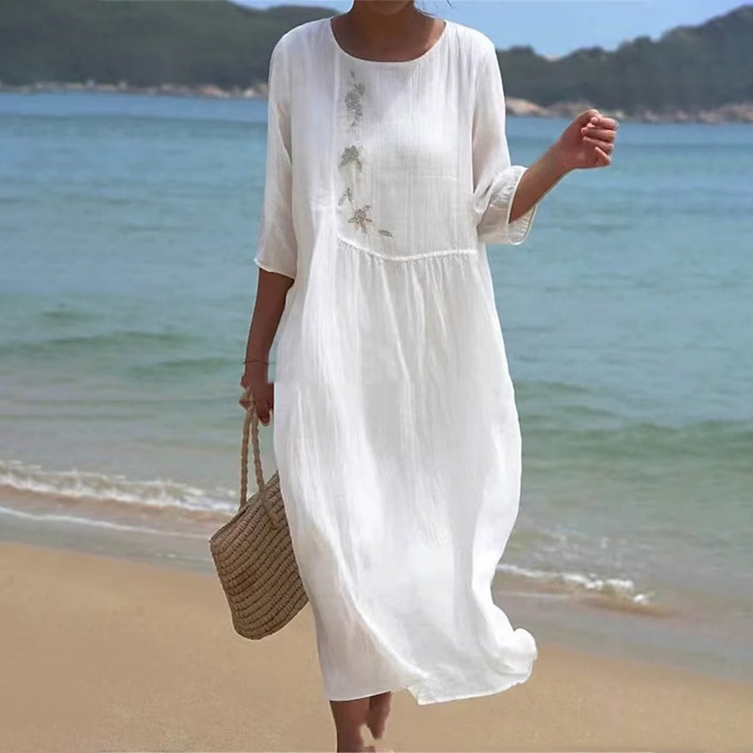 Vestido Blanco Ligero de Largo Medio con Corte Sin Mangas y Bajo Acampanado | Ideal para Verano